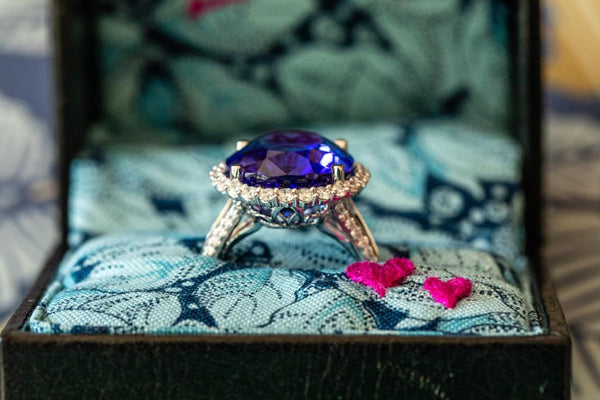 Oval Tanzanite & Diamond ring set in 18ct white gold