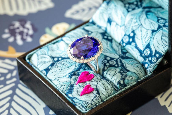 Oval Tanzanite & Diamond ring set in 18ct white gold