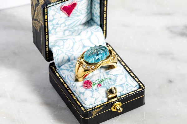 Blue topaz & diamond ring set in 18ct yellow gold