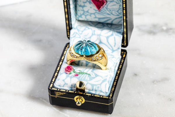 Blue topaz & diamond ring set in 18ct yellow gold
