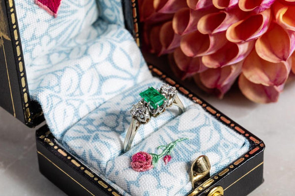 Emerald and Diamond trilogy ring set in white gold