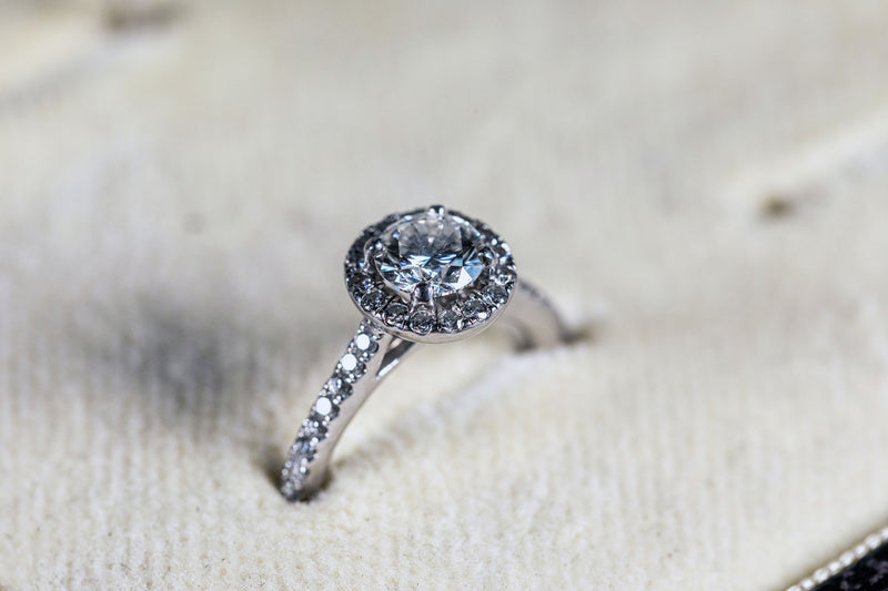 Diamond Solitaire Ring set with Diamond Halo and Diamond shank set in 18ct White Gold