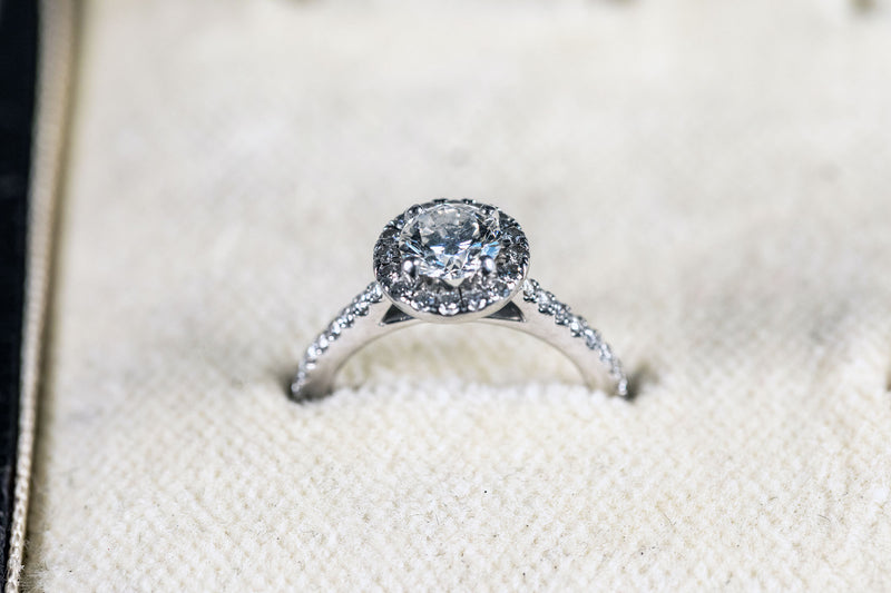 Diamond Solitaire Ring set with Diamond Halo and Diamond shank set in 18ct White Gold