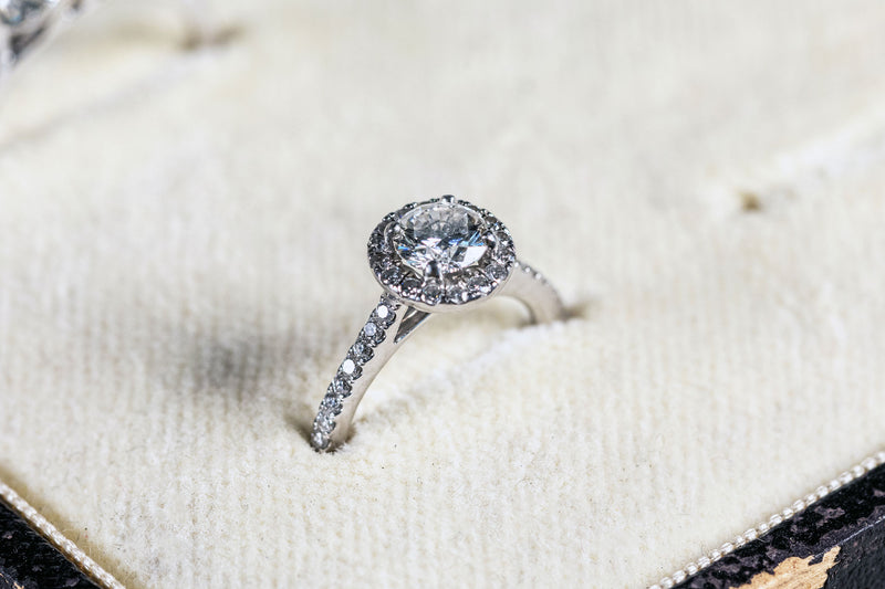 Diamond Solitaire Ring set with Diamond Halo and Diamond shank set in 18ct White Gold