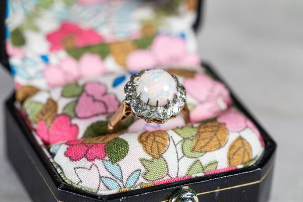 Opal and Diamond Ring set in 18ct Gold